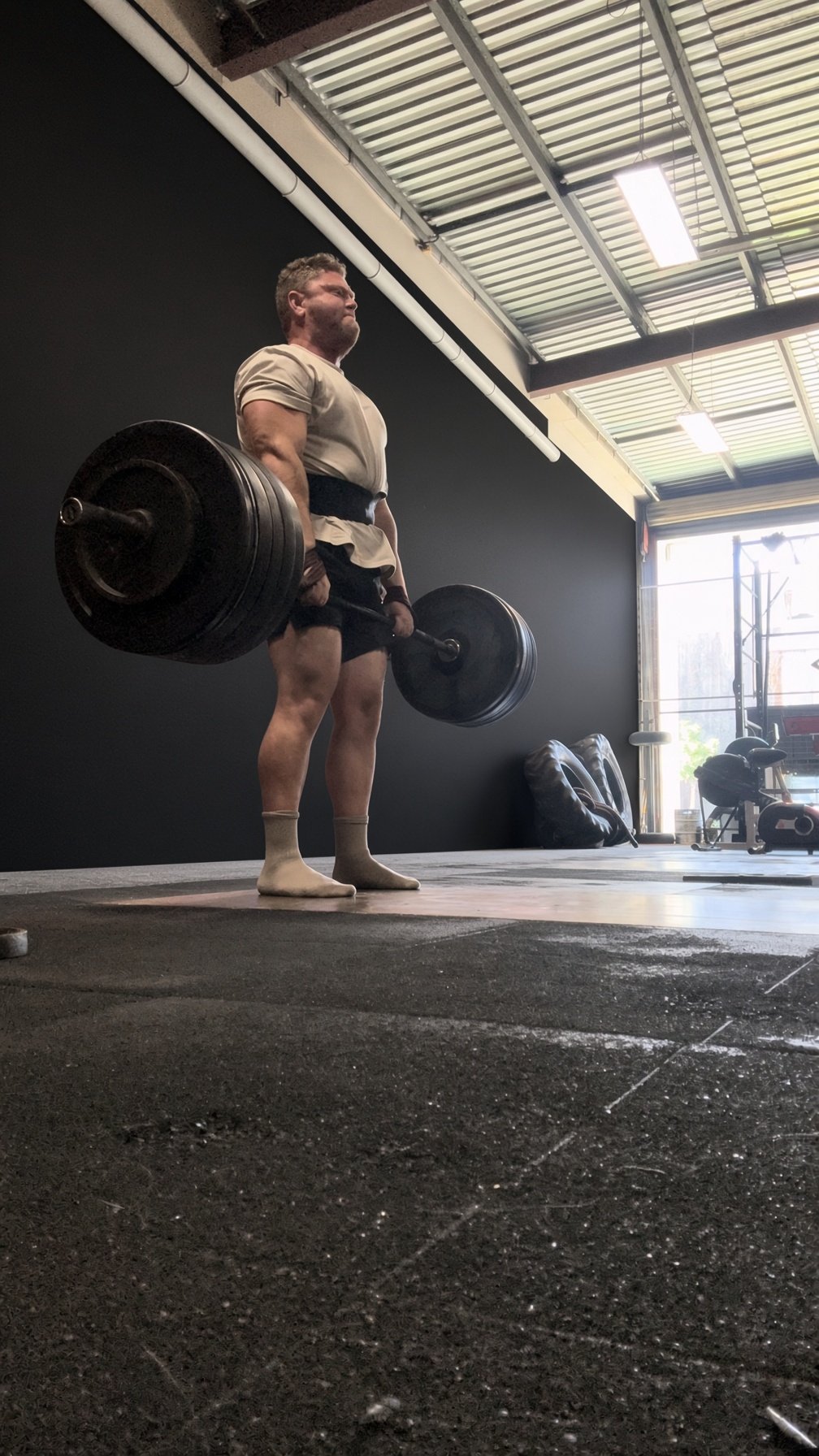 Teenage boys learning the deadlift