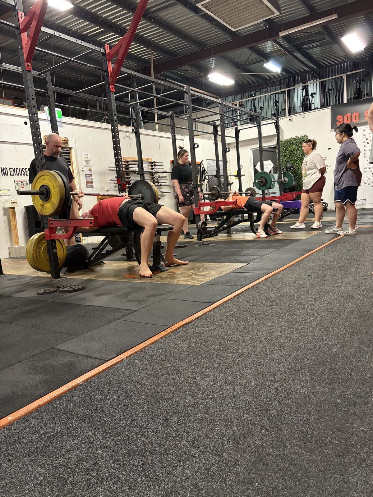 Group session, bench press on the floor